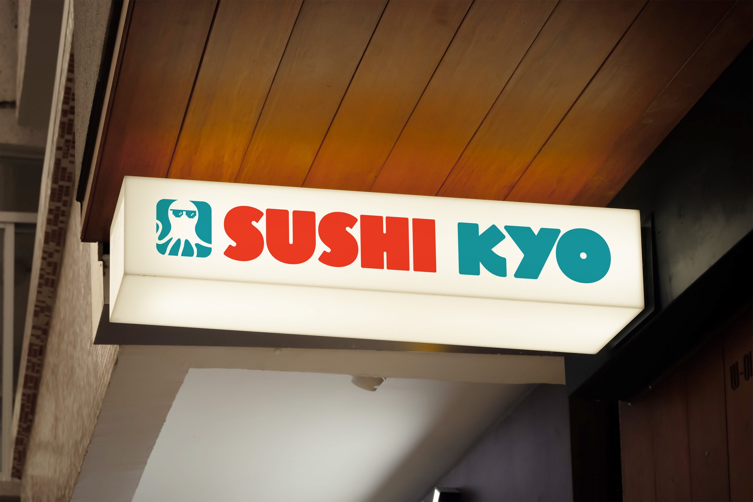 Illuminated sushi restaurant sign with bold logo and typography