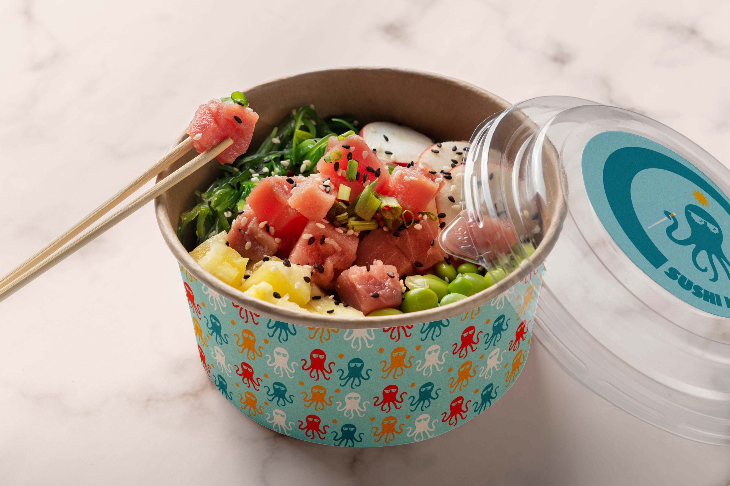 Sushi bowl packaging with repeat pattern and playful octopus illustrations for restaurant branding