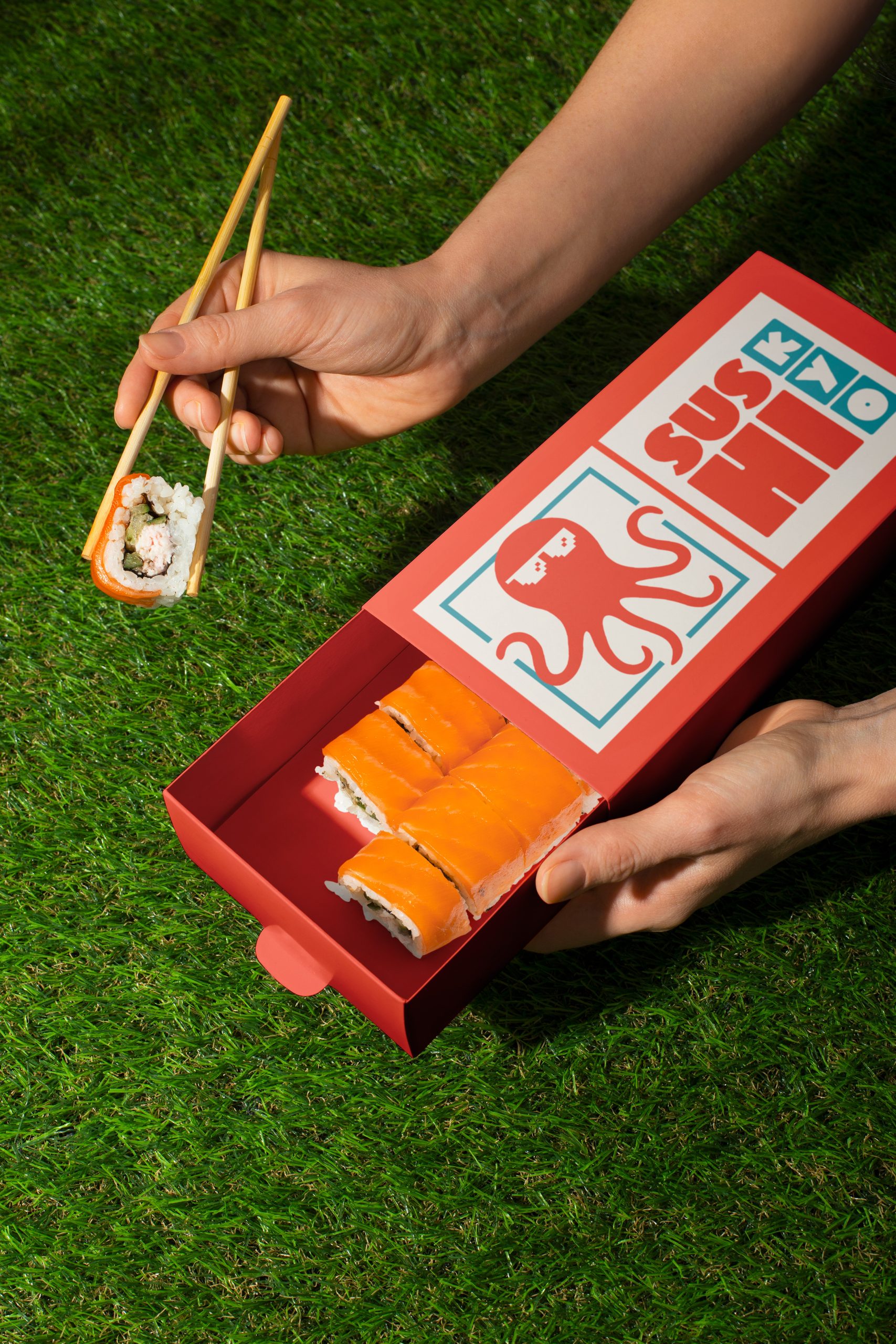 Sushi takeaway box design with bold logo and modern restaurant branding