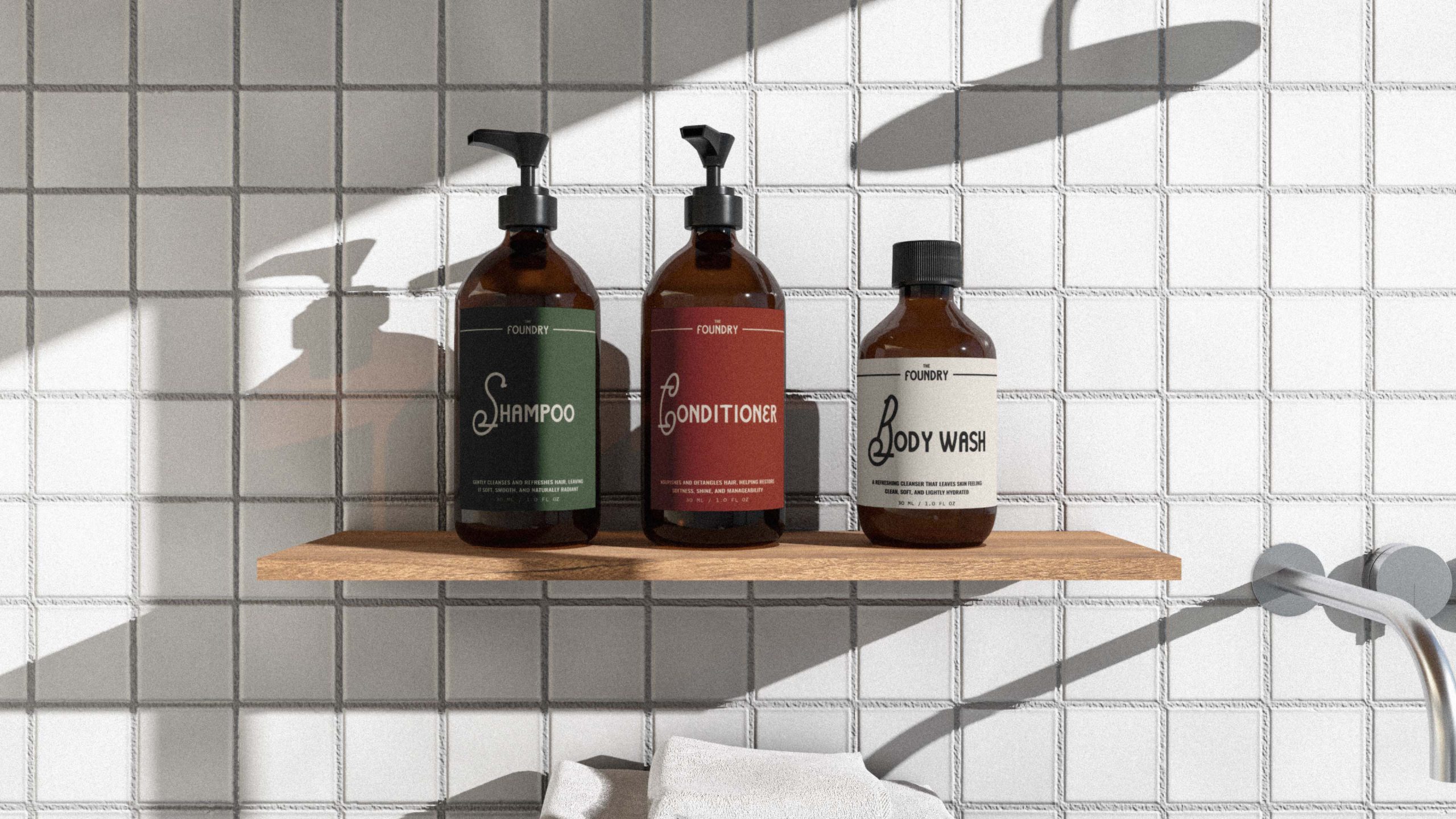Branded hotel bathroom amenities including shampoo, conditioner and body wash bottles