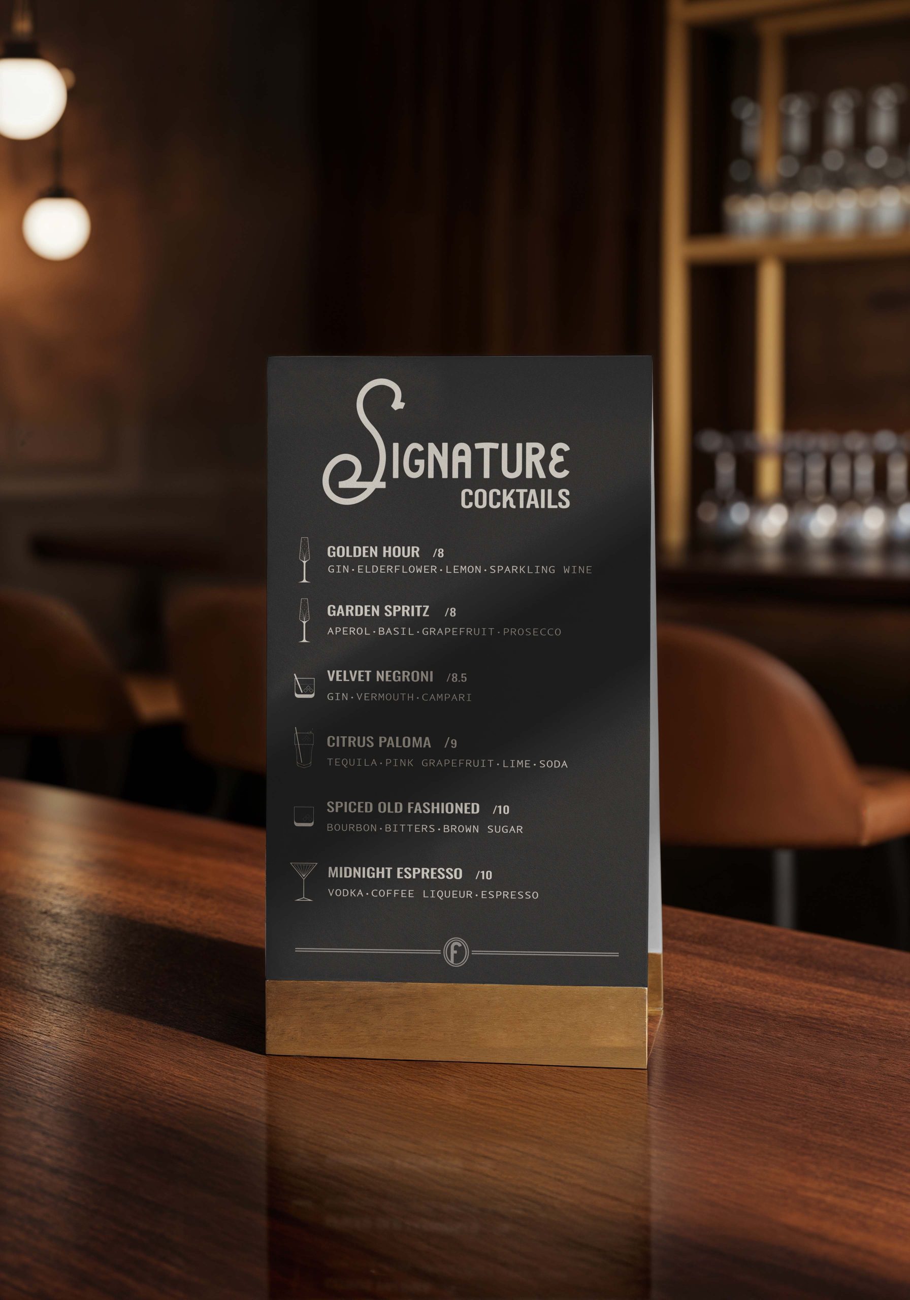 Cocktail menu displayed on a hotel bar table