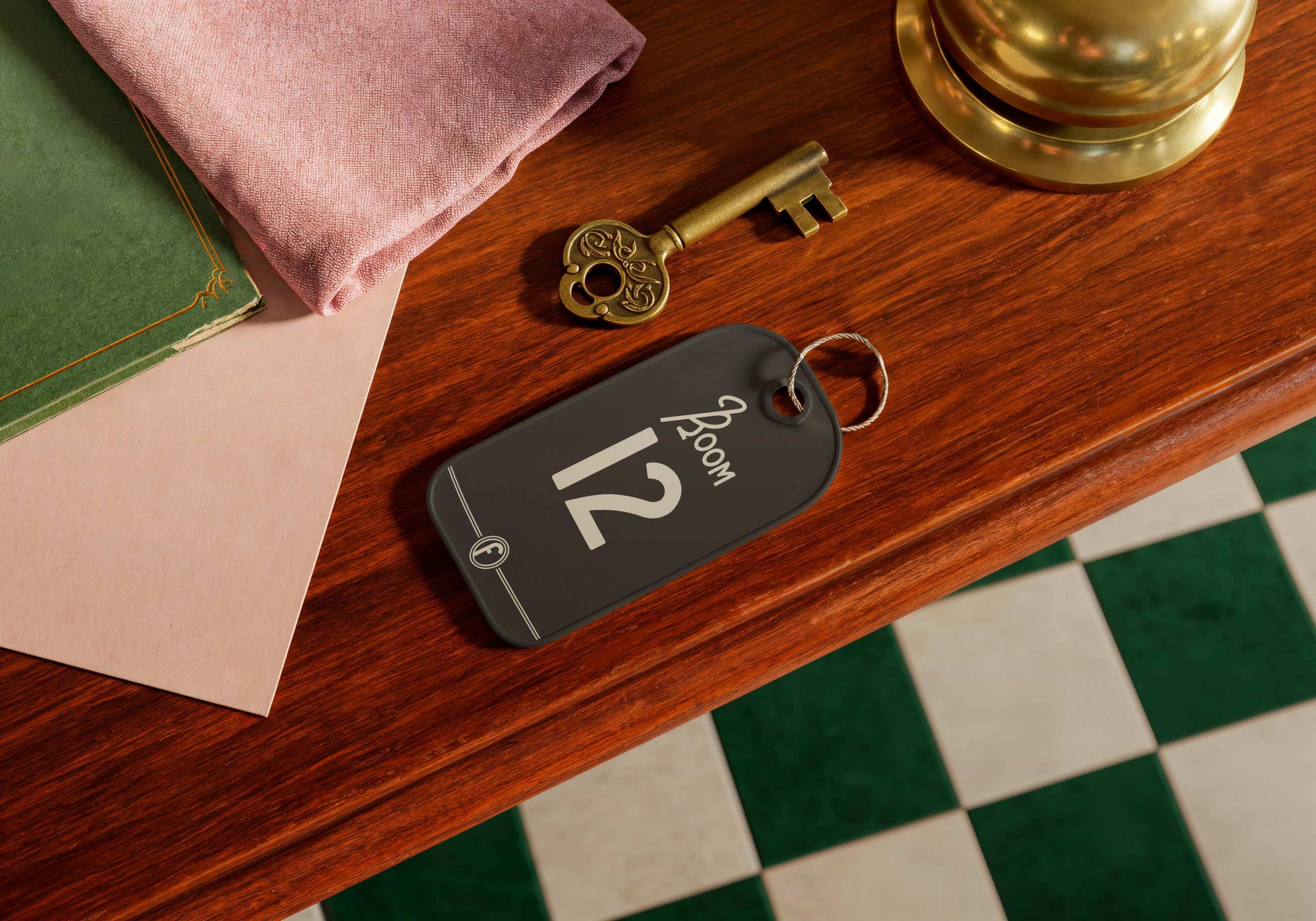 Hotel room key tag displayed on a wooden reception desk